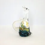 Colorful hand-blown glass cat figurine from Malta with intricate details.